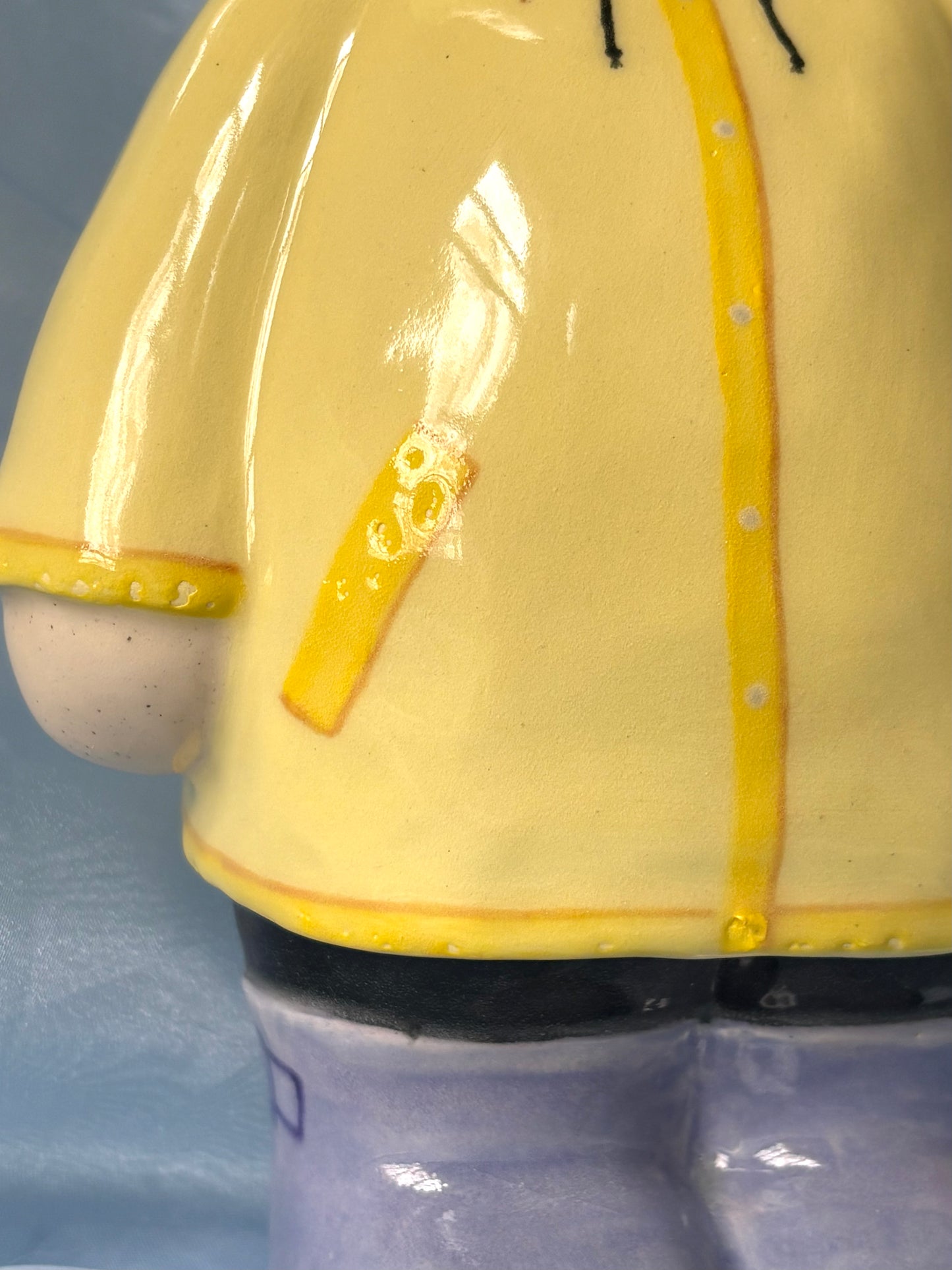Raincoat Doll Vase