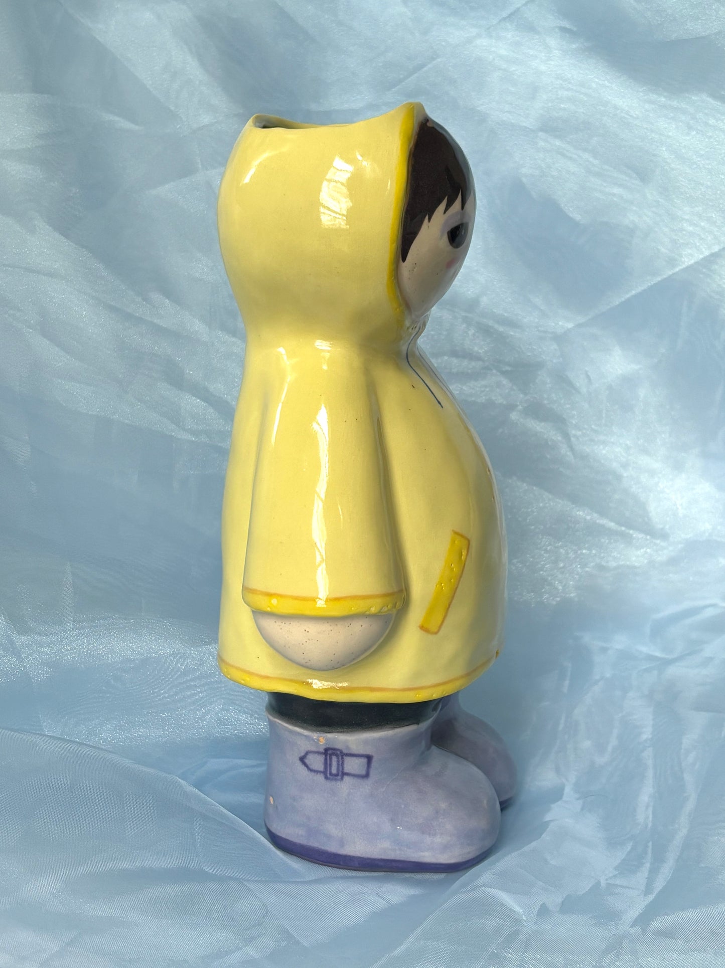 Raincoat Doll Vase
