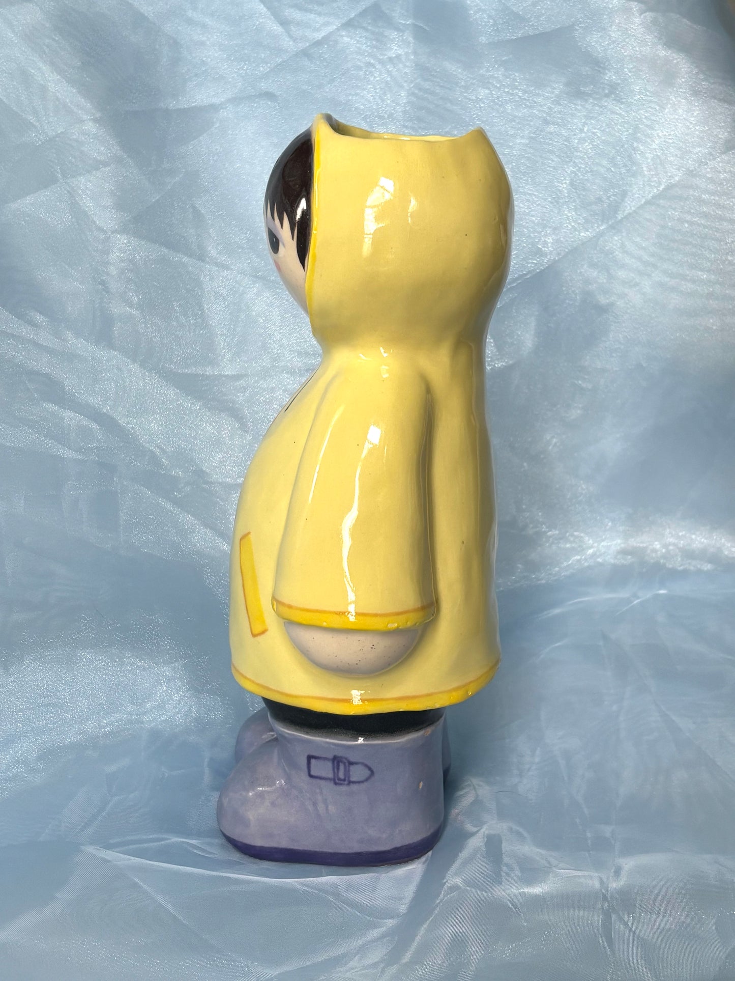 Raincoat Doll Vase