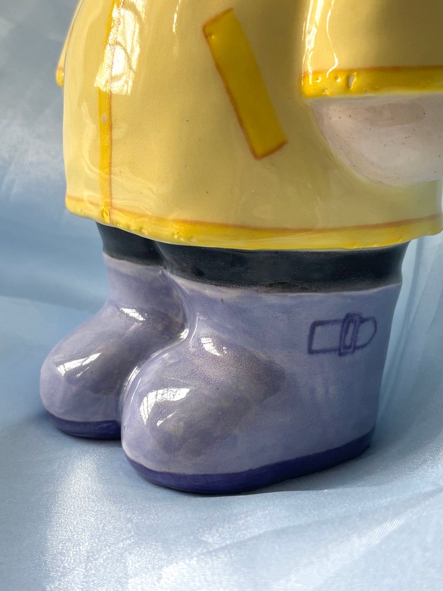 Raincoat Doll Vase